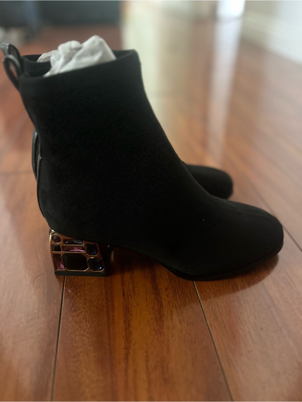 black suede ankle boots feature a unique crystal-embellished chunky block he